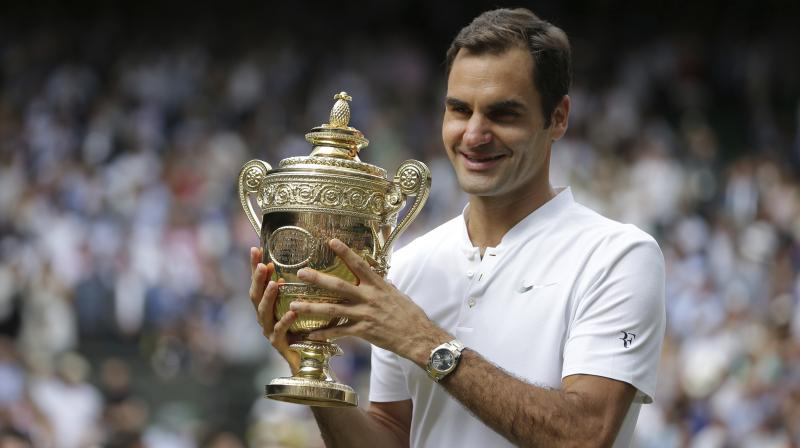 Federer became the only man on Sunday to win eight Wimbledon titles. (Photo: AP) Federer became the only man on Sunday to win eight Wimbledon titles. (Photo: AP)
