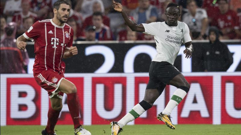 Bayern Munich's Javi Martinez, left, and Liverpool's Sadio Mane vie for the ball during the Audi Cup semifinal soccer match between FC Bayern Munich and Liverpool FC. (Photo: AP) Bayern Munich's Javi Martinez, left, and Liverpool's Sadio Mane vie for the ball during the Audi Cup semifinal soccer match between FC Bayern Munich and Liverpool FC. (Photo: AP)