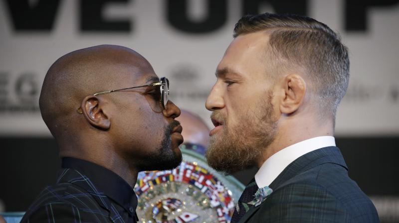 McGregor faces his first ever professional boxing contest against Mayweather, the undefeated former welterweight king who has come out of a two-year retirement to take on the Irish mixed martial arts star. (Photo: AP) McGregor faces his first ever professional boxing contest against Mayweather, the undefeated former welterweight king who has come out of a two-year retirement to take on the Irish mixed martial arts star. (Photo: AP)