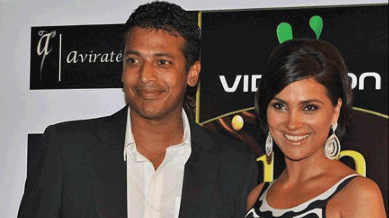 Lara Dutta and husband Mahesh Bhupathi shared a casual banter during the Mumbai rains. (Photo: PTI) Lara Dutta and husband Mahesh Bhupathi shared a casual banter during the Mumbai rains. (Photo: PTI)