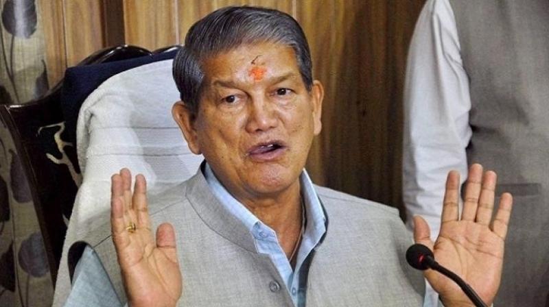 Harish Rawat.