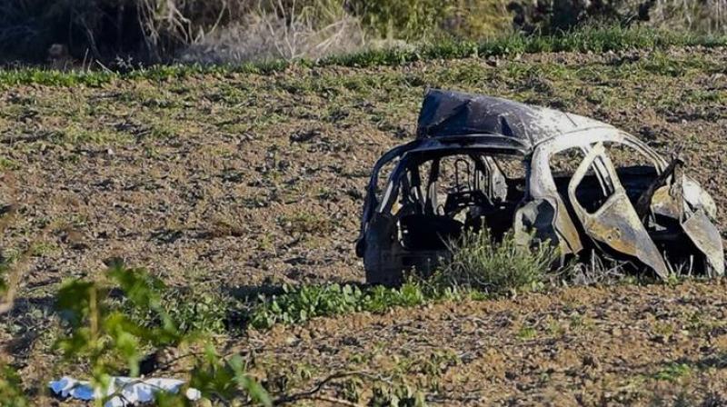 The wreckage of the car of investigative journalist Daphne Caruana Galizia lies next to a road in the town of Mosta, Malta, Monday, Oct. 16, 2017. (Photo: AP) The wreckage of the car of investigative journalist Daphne Caruana Galizia lies next to a road in the town of Mosta, Malta, Monday, Oct. 16, 2017. (Photo: AP)
