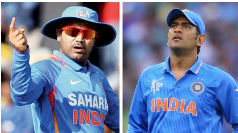 There is intense speculation that Dhoni, who has already retired from the Test format, has played his last ODI following India's semifinal exit from the World Cup. Sehwag feels that retirement is Dhoni's individual call but selectors must speak to him before announcing the West Indies squad. (Photo:AFP) There is intense speculation that Dhoni, who has already retired from the Test format, has played his last ODI following India's semifinal exit from the World Cup. Sehwag feels that retirement is Dhoni's individual call but selectors must speak to him before announcing the West Indies squad. (Photo:AFP)