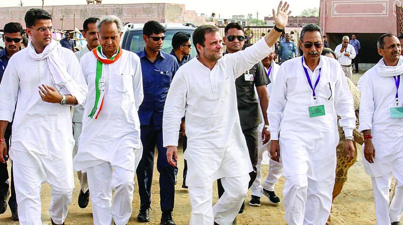 Congress president Rahul Gandhi, Rajasthan CM Ashok Gehlot and deputy CM Sachin Pilot arrive for a rally in Bharatpur on Friday. (PTI) Congress president Rahul Gandhi, Rajasthan CM Ashok Gehlot and deputy CM Sachin Pilot arrive for a rally in Bharatpur on Friday. (PTI)