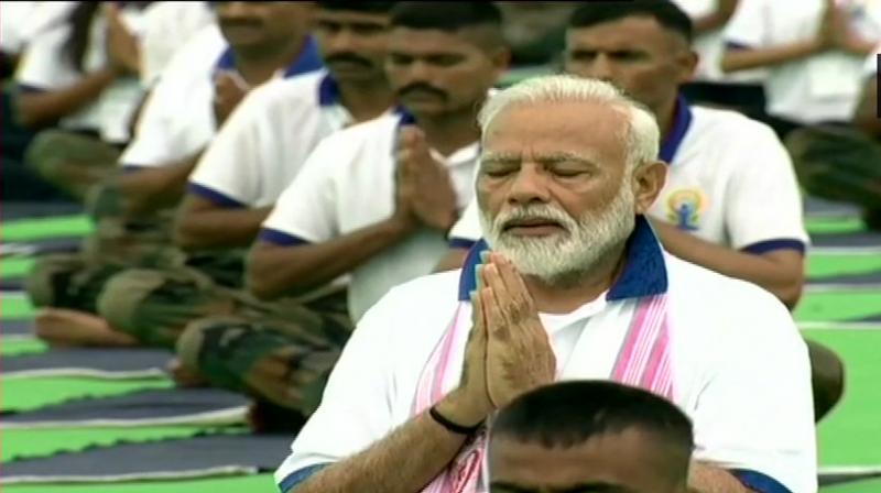 Prime Minister Narendra Modi performs yoga at Prabhat Tara ground in Ranchi on 5th International Day. (Photo: Twitter/ ANI) Prime Minister Narendra Modi performs yoga at Prabhat Tara ground in Ranchi on 5th International Day. (Photo: Twitter/ ANI)