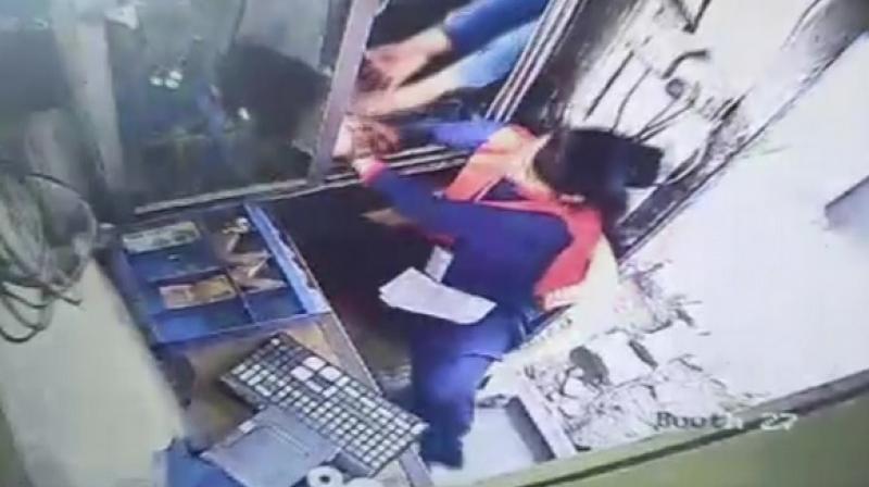 The female toll plaza employee was sitting in booth number 27 when at around 9 am a black SUV approached the toll gate. (Photo: ANI) The female toll plaza employee was sitting in booth number 27 when at around 9 am a black SUV approached the toll gate. (Photo: ANI)
