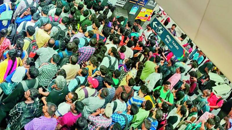 A swarm of commuters at Hitec City metro station A swarm of commuters at Hitec City metro station