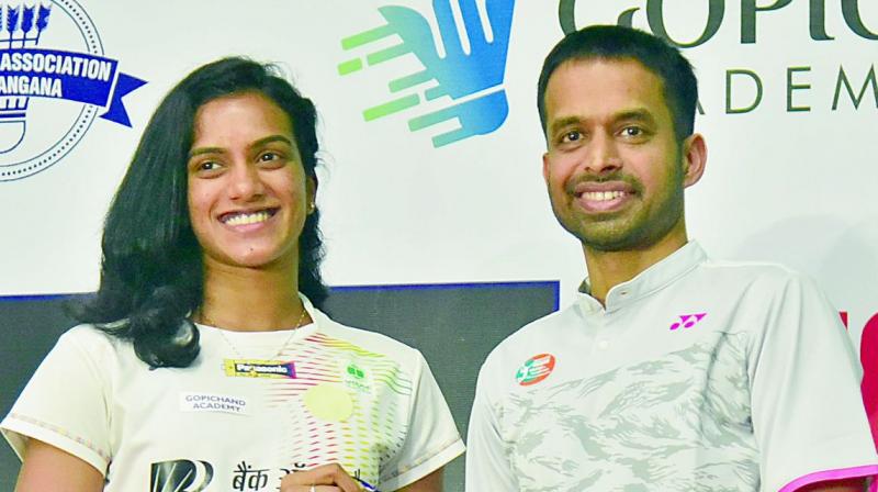 P. V. Sindhu with Pullela Gopichand in Hyderabad on Tuesday. (Photo: R. Pavan) P. V. Sindhu with Pullela Gopichand in Hyderabad on Tuesday. (Photo: R. Pavan)