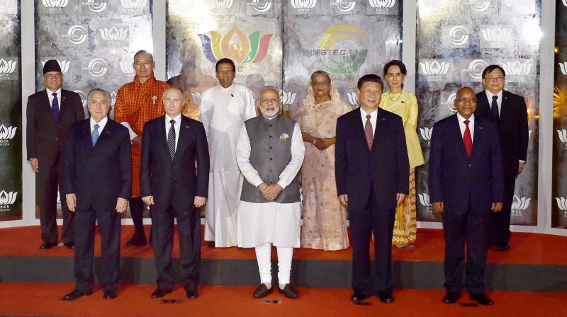 Prime Minister Narendra Modi along with BRICS and BIMSTEC leaders pose for a group photo during the BRICS and BIMSTEC Summits in Mobor, Goa. (Photo: PTI) Prime Minister Narendra Modi along with BRICS and BIMSTEC leaders pose for a group photo during the BRICS and BIMSTEC Summits in Mobor, Goa. (Photo: PTI)
