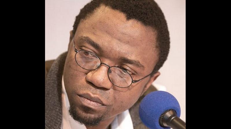 Patrice Nganang, a professor at New York's Stony Brook University, is due to go before a prosecutor in the coming week. (Photo: Twitter/ @nganang) Patrice Nganang, a professor at New York's Stony Brook University, is due to go before a prosecutor in the coming week. (Photo: Twitter/ @nganang)