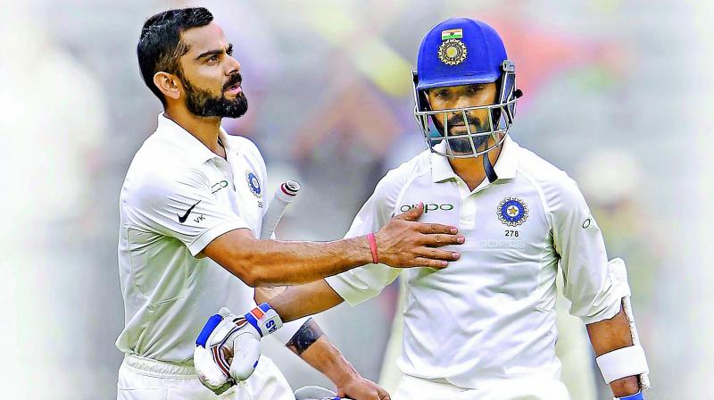 Virat Kohli and Ajinkya Rahane scored unbeaten half-centuries on day two of the second Test at Perth. Virat Kohli and Ajinkya Rahane scored unbeaten half-centuries on day two of the second Test at Perth.