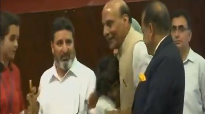 9-year-old Kashmiri girl Tajamul Islam, who won the 2016 World Kickboxing Championship hugged Home Minister Rajnath Singh and also took a selfie with him and J&K CM Mehbooba Mufti. (Photo: Screengrab/ANI) 9-year-old Kashmiri girl Tajamul Islam, who won the 2016 World Kickboxing Championship hugged Home Minister Rajnath Singh and also took a selfie with him and J&K CM Mehbooba Mufti. (Photo: Screengrab/ANI)