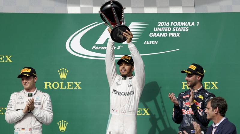 Lewis Hamilton produced a flawless drive from pole position to finish almost five seconds ahead of his Mercedes team-mate and championship leader Nico Rosberg to seal the 50th win of his glittering Formula One career. (Photo: AP) Lewis Hamilton produced a flawless drive from pole position to finish almost five seconds ahead of his Mercedes team-mate and championship leader Nico Rosberg to seal the 50th win of his glittering Formula One career. (Photo: AP)