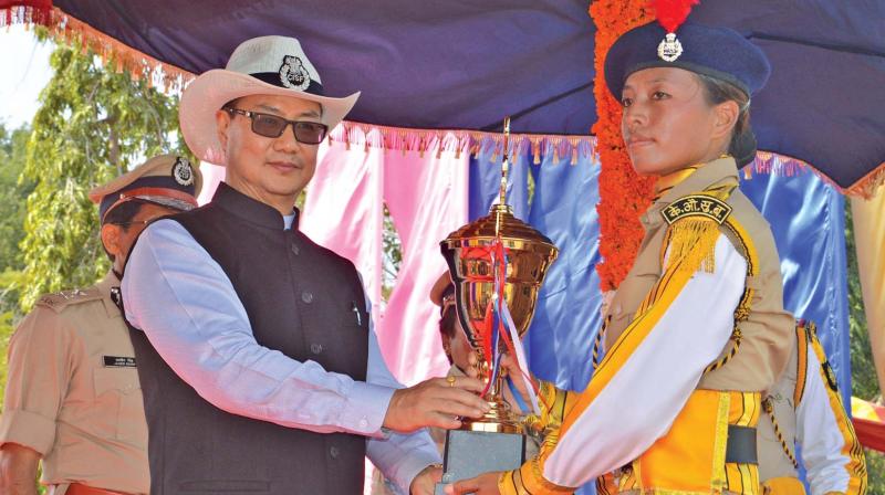 Union minister Kiren Rijiju presents a trophy at the CISF passing out parade on Sunday.(Photo: K. Senthilnathan) Union minister Kiren Rijiju presents a trophy at the CISF passing out parade on Sunday.(Photo: K. Senthilnathan)
