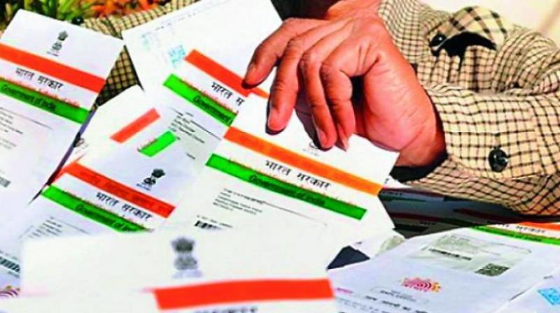 Aadhaar is a 12-digit number, issued by the Unique Identification Authority of India (UIDAI), that acts as identification and address proof. (Photo: File) Aadhaar is a 12-digit number, issued by the Unique Identification Authority of India (UIDAI), that acts as identification and address proof. (Photo: File)