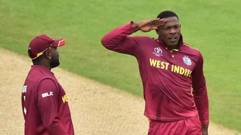 Sheldon Cottrell, whose flamboyant wicket-taking celebration involves a short march, stand to attention and salute to the pavilion, will meanwhile be doing his best to get on Bayliss’s nerves. (Photo: AFP) Sheldon Cottrell, whose flamboyant wicket-taking celebration involves a short march, stand to attention and salute to the pavilion, will meanwhile be doing his best to get on Bayliss’s nerves. (Photo: AFP)