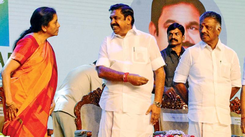 Defence minister Nirmala Sitharaman with Chief Minister Edappadi K. Palaniswami and Deputy CM O.Panneerselvam on the dais.(Photo: DC) Defence minister Nirmala Sitharaman with Chief Minister Edappadi K. Palaniswami and Deputy CM O.Panneerselvam on the dais.(Photo: DC)