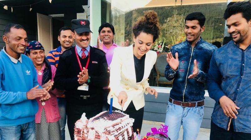Kangana Ranaut and her caretakers from Manali bungalow. Kangana Ranaut and her caretakers from Manali bungalow.