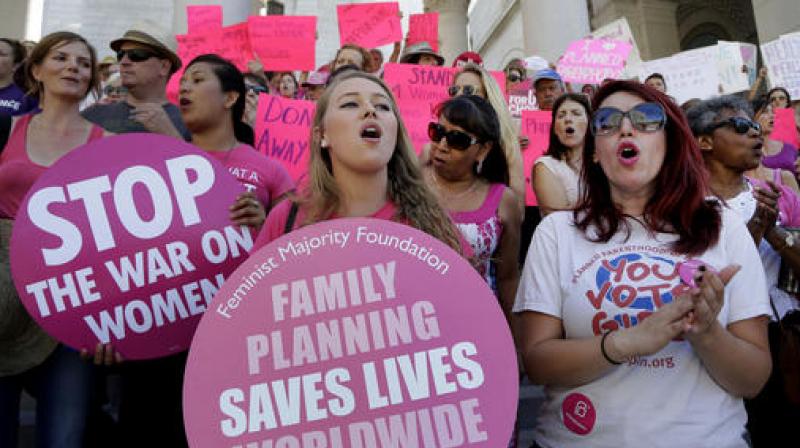 Planned Parenthood supporters rally for women's access to reproductive health care on Planned Parenthood supporters rally for women's access to reproductive health care on