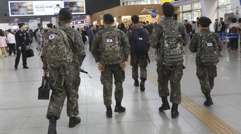 A watchdog group says South Korea's army is hunting down and prosecuting gay servicemen after a video of two male soldiers having sex was posted on the internet earlier this year, stoking fear in an already persecuted minority group. (Photo: AP) A watchdog group says South Korea's army is hunting down and prosecuting gay servicemen after a video of two male soldiers having sex was posted on the internet earlier this year, stoking fear in an already persecuted minority group. (Photo: AP)