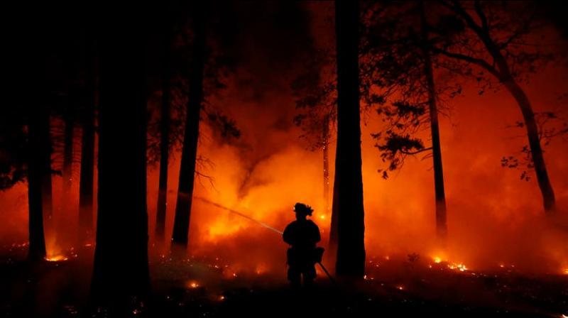 A National Weather Service satellite photo showing smoke hanging over the island was posted on local media and social media sites. (Photo: Representative Image/AFP) A National Weather Service satellite photo showing smoke hanging over the island was posted on local media and social media sites. (Photo: Representative Image/AFP)