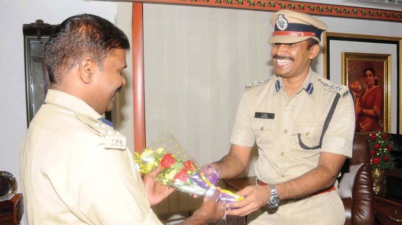 Former commissioner Sparjan Kumar welcomes P. Prakash (right) as he took charge as Thiruvananathapuram city police commissioner on Monday. (Photo: A.V. MUZAFAR) Former commissioner Sparjan Kumar welcomes P. Prakash (right) as he took charge as Thiruvananathapuram city police commissioner on Monday. (Photo: A.V. MUZAFAR)