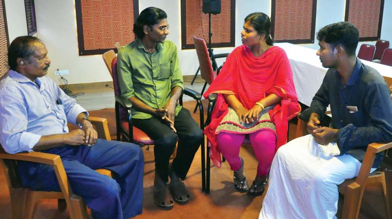 Sisily George with C.K. Velayudhan, Vineetha P.K and Balakrishnan A - the three para legal volunteers from among tribal communities in Kozhikode. Sisily George with C.K. Velayudhan, Vineetha P.K and Balakrishnan A - the three para legal volunteers from among tribal communities in Kozhikode.