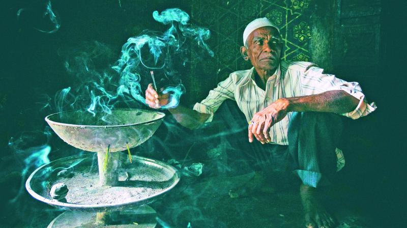 Caretaker at dargah in Bidar. Caretaker at dargah in Bidar.