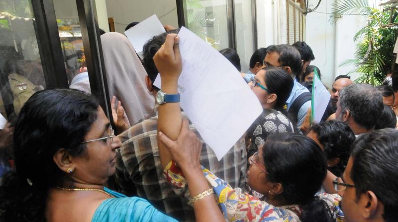 A woman helps her daughter enter the MBBS Counselling Hall at the medical college in Thiruvananthapuram. — DC FILE A woman helps her daughter enter the MBBS Counselling Hall at the medical college in Thiruvananthapuram. — DC FILE