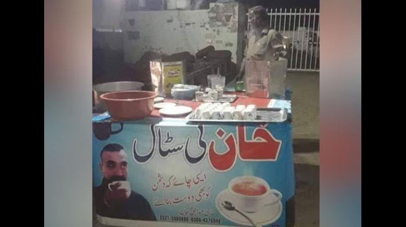A tea stall somewhere in the country has put up a banner with an image of Wing Commander Varthaman, sipping tea, and the text on the banner in Urdu reads: 'Aisi Chai Ki Dushman Ko Bhi Dost Banaye.' (Photo: ANI) A tea stall somewhere in the country has put up a banner with an image of Wing Commander Varthaman, sipping tea, and the text on the banner in Urdu reads: 'Aisi Chai Ki Dushman Ko Bhi Dost Banaye.' (Photo: ANI)
