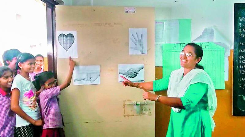 Sabbu Rupa greeting her students at Telangana Social Welfare Residential School in Yadadri. Sabbu Rupa greeting her students at Telangana Social Welfare Residential School in Yadadri.