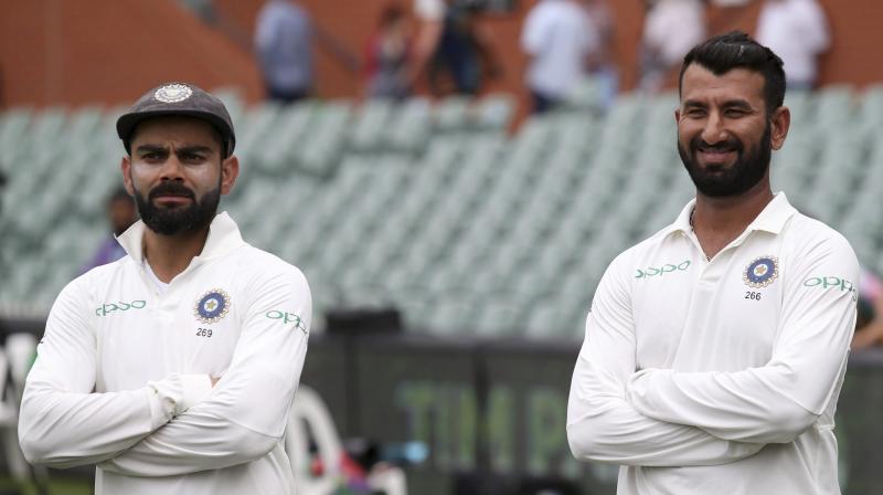 India captain Virat Kohli has maintained his top spot, Cheteshwar Pujara returned to top five while Jasprit Bumrah achieved a career-high ranking of 33 in the latest ICC Test rankings for batsmen and bowlers. (Photo: AP) India captain Virat Kohli has maintained his top spot, Cheteshwar Pujara returned to top five while Jasprit Bumrah achieved a career-high ranking of 33 in the latest ICC Test rankings for batsmen and bowlers. (Photo: AP)