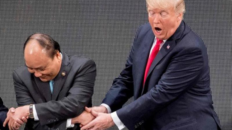 After an awkward few seconds, Trump appeared to recognise his error and made the link between Nguyen and Duterte. (Photo: AFP) After an awkward few seconds, Trump appeared to recognise his error and made the link between Nguyen and Duterte. (Photo: AFP)