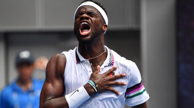 Frances Tiafoe rolled up his sleeve, flexed and slapped his biceps muscle five times to celebrate the biggest victory of his career. (Photo: AFP) Frances Tiafoe rolled up his sleeve, flexed and slapped his biceps muscle five times to celebrate the biggest victory of his career. (Photo: AFP)