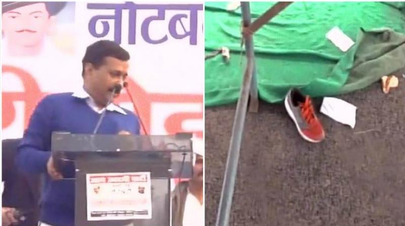 A man on Sunday threw a shoe at Delhi Chief Minister Arvind Kejriwal while he was addressing a rally against demonetisation in Rohtak, Haryana. (Photo: ANI/Twitter) A man on Sunday threw a shoe at Delhi Chief Minister Arvind Kejriwal while he was addressing a rally against demonetisation in Rohtak, Haryana. (Photo: ANI/Twitter)