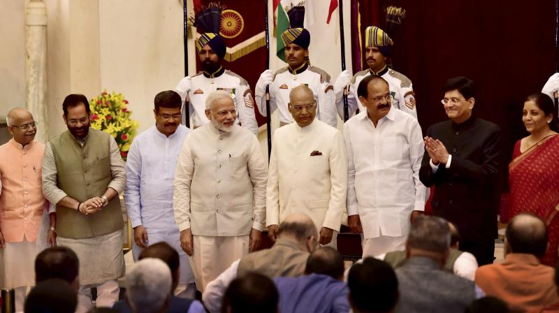 Nine ministers took oath and four were promoted to Cabinet ranks as part of third reshuffle Modi carried out in as many years. (Photo: PTI) Nine ministers took oath and four were promoted to Cabinet ranks as part of third reshuffle Modi carried out in as many years. (Photo: PTI)