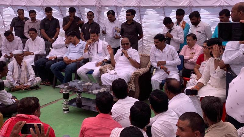 The former Union Agriculture minister also interacted with people from Khadkat village in Ashti taluka of the district. (Photo: Twitter/ @PawarSpeaks) The former Union Agriculture minister also interacted with people from Khadkat village in Ashti taluka of the district. (Photo: Twitter/ @PawarSpeaks)