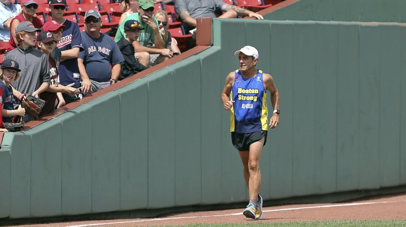 Boston Marathon race director Dave McGillivray is amplifying that message for marathoners, especially those who have coronary artery disease or a family history of it. (Photo: AP) Boston Marathon race director Dave McGillivray is amplifying that message for marathoners, especially those who have coronary artery disease or a family history of it. (Photo: AP)