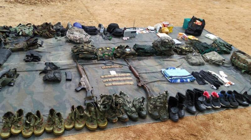 The weapons found by the raiding team included an American made M16 assault rifle with 125 rounds, one self-loading rifle with 26 rounds and some AK series assault rifles, apart from other ‘warlike stores’. (Photo: Twitter | @easterncomd) The weapons found by the raiding team included an American made M16 assault rifle with 125 rounds, one self-loading rifle with 26 rounds and some AK series assault rifles, apart from other ‘warlike stores’. (Photo: Twitter | @easterncomd)