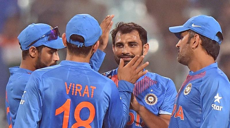 Comeback man Mohammed Shami (3/47 in 8 overs) along with Bhuvneshwar Kumar (3/28 in 6.4 overs) shared bulk of the spoils to dismiss New Zealand for a meagre 189 in 38.4 overs. (Photo: PTI) Comeback man Mohammed Shami (3/47 in 8 overs) along with Bhuvneshwar Kumar (3/28 in 6.4 overs) shared bulk of the spoils to dismiss New Zealand for a meagre 189 in 38.4 overs. (Photo: PTI)