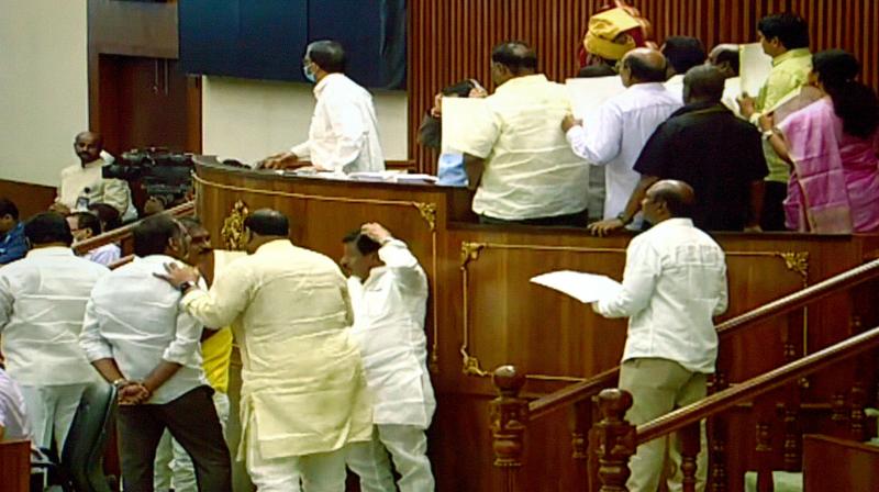 AP Legislative Council witnessed pandemonium on Friday over a remark that agriculture activities are a waste of time, with TD members trooping into the well and demanding an apology from the ruling YSRC members. (Photo by arrangement)