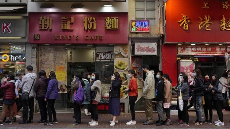 China and South Korea have consulted Japan about easing border controls on business travellers to help revive business activities. (AP Photo) China and South Korea have consulted Japan about easing border controls on business travellers to help revive business activities. (AP Photo)