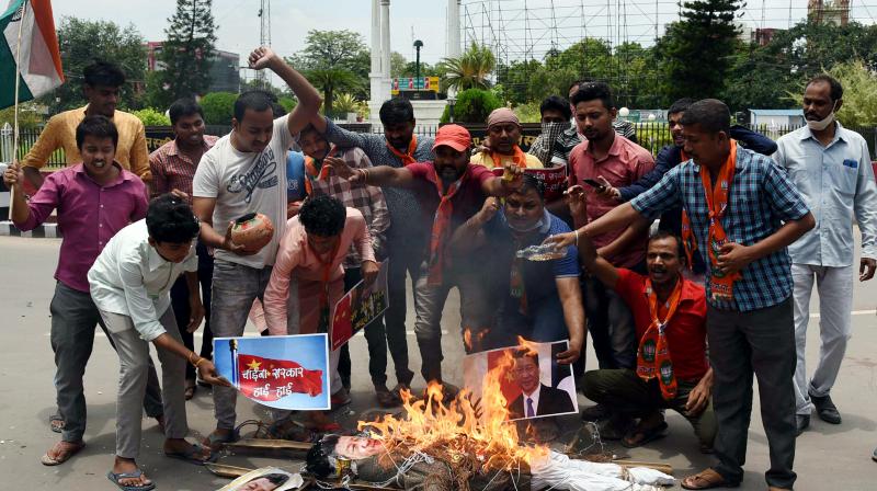 Traders' body CAIT on Monday burnt Chinese goods in Delhi's main market Karol Bagh. (PTI Photo) Traders' body CAIT on Monday burnt Chinese goods in Delhi's main market Karol Bagh. (PTI Photo)