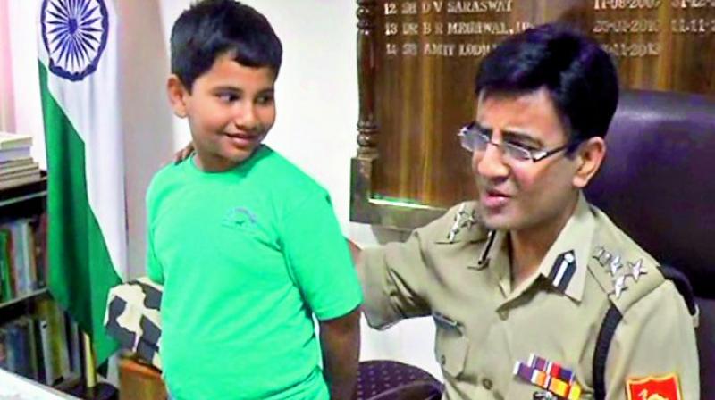 Nine-year-old Ravikar Reddy from Telangana who visited the Indo-Pakistan border and interacted with BSF jawans, seen with BSF director general K.K. Sharma Nine-year-old Ravikar Reddy from Telangana who visited the Indo-Pakistan border and interacted with BSF jawans, seen with BSF director general K.K. Sharma