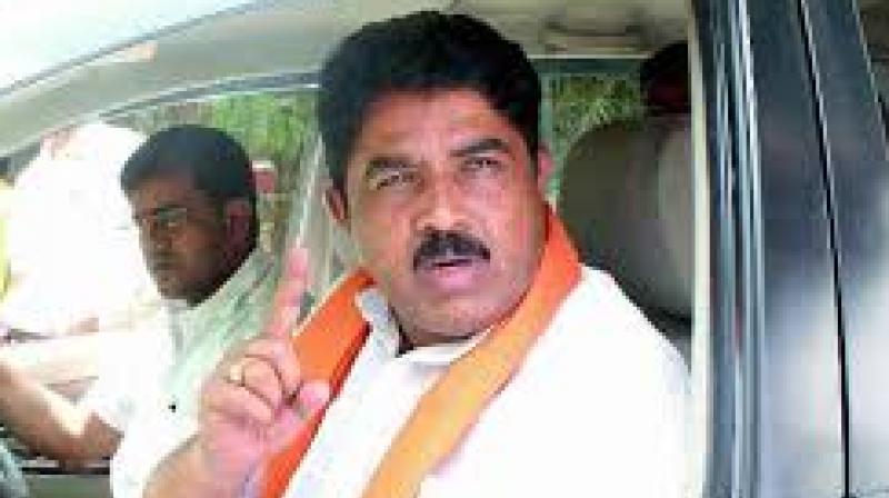 R Ashok. R Ashok.