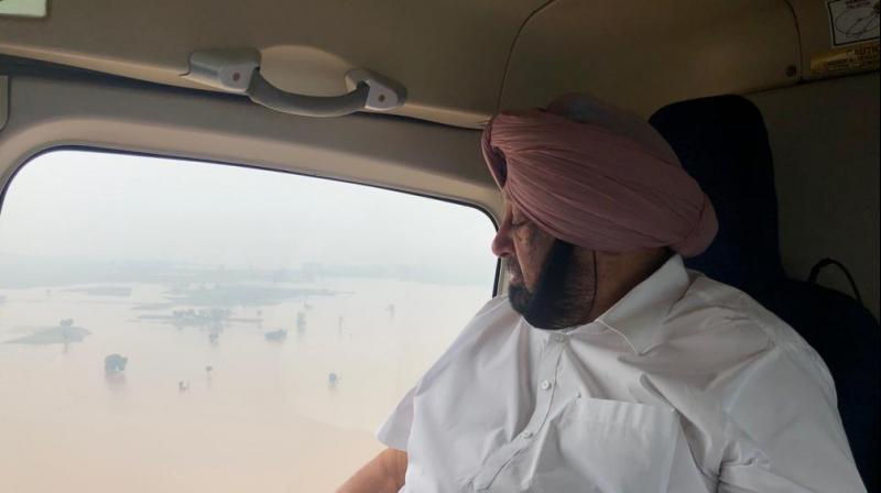 'The situation is not that good on both sides of Ghaggar river. The water has gone up to Bathinda. Nobody expected that the water would come to this level by the end of July. Normally, the flooding occurs in August in Punjab but the rains have aggravated the situation in this month,' the Chief Minister said. (Photo: Twitter I capt _amarinder) 'The situation is not that good on both sides of Ghaggar river. The water has gone up to Bathinda. Nobody expected that the water would come to this level by the end of July. Normally, the flooding occurs in August in Punjab but the rains have aggravated the situation in this month,' the Chief Minister said. (Photo: Twitter I capt _amarinder)