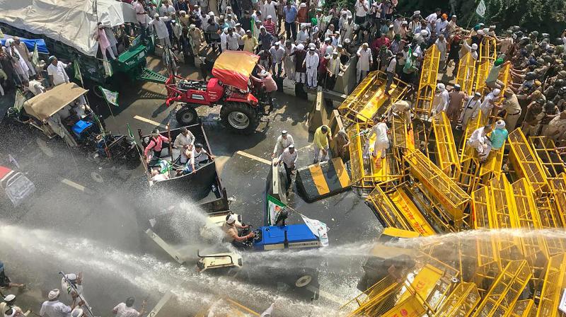 Farmers along the UP-Delhi border were stopped during the 'Kisan Kranti Padyatra' and police resorted to using of teargas shells and water cannons to disperse the protesters. (Photo: PTI) Farmers along the UP-Delhi border were stopped during the 'Kisan Kranti Padyatra' and police resorted to using of teargas shells and water cannons to disperse the protesters. (Photo: PTI)
