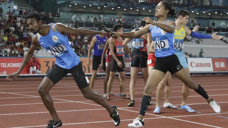 The Indian quartet of Mohd. Anas, Poovamma, Hima and Arokia Rajiv clocked 3 minute and 15.71 seconds to finish behind Bahrain (3:11.89) in the event which was making a debut in the Asian Games. (Photo: AP) The Indian quartet of Mohd. Anas, Poovamma, Hima and Arokia Rajiv clocked 3 minute and 15.71 seconds to finish behind Bahrain (3:11.89) in the event which was making a debut in the Asian Games. (Photo: AP)
