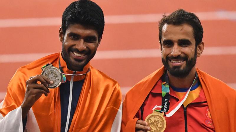 The two gold, a silver from 4x400m men's relay team and a bronze each from discus thrower Seema Punia and 1500m runner P U Chitra on Thursday took India's medal tally from athletics to 19 (7 gold, 10 silver, two bronze). (Photo: AFP) The two gold, a silver from 4x400m men's relay team and a bronze each from discus thrower Seema Punia and 1500m runner P U Chitra on Thursday took India's medal tally from athletics to 19 (7 gold, 10 silver, two bronze). (Photo: AFP)