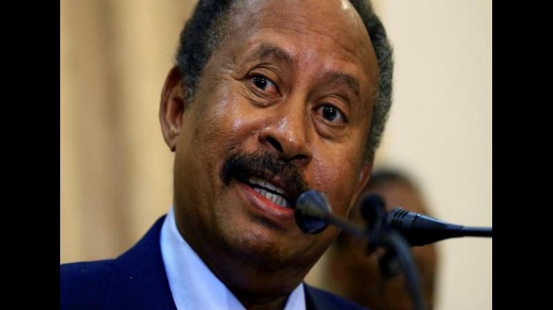 According to SUNA news agency, Hamdok was sworn in before Abdel Fattah Al-Burhan, chairman of the newly-formed Sovereign Council, at the presidential palace in the capital Khartoum in presence of the chief justice. (Photo: ANI) According to SUNA news agency, Hamdok was sworn in before Abdel Fattah Al-Burhan, chairman of the newly-formed Sovereign Council, at the presidential palace in the capital Khartoum in presence of the chief justice. (Photo: ANI)